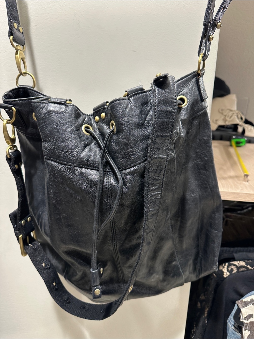 BCBGMaxAzria Black Leather Drawstring Satchel